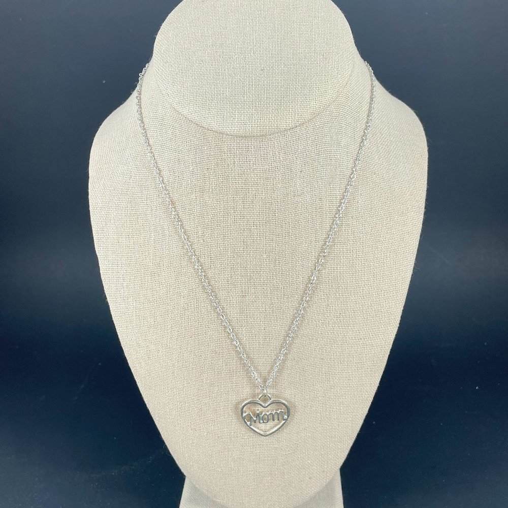 Necklace silver toned 19 inch with a 2 1/2 " extension and a lobster claw catch
